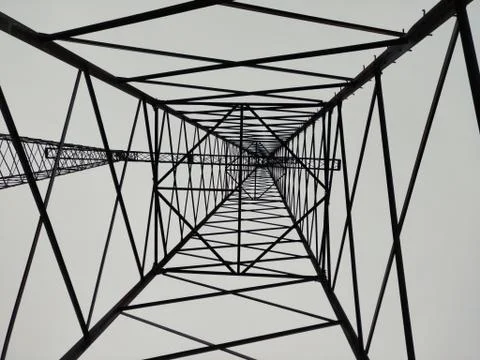 Inside electrical tower on gray sky background Stock Photos