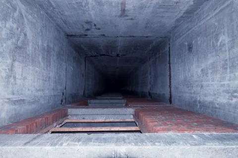 Inside the elevator shaft in a concrete building. Stock Photos