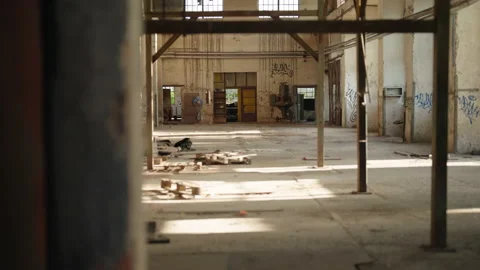Inside empty abandoned industrial factory reveal 4K Stock Footage 198004817