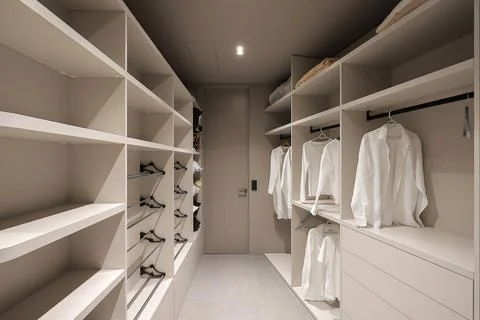 Inside empty dressing room interior with shelves Stock Photos