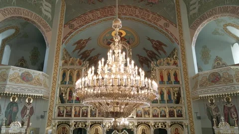 Inside an empty Greek Catholic cathedral. Church interior. Rows for parishioners Stock Footage 252354479