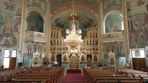 Inside an empty Greek Catholic cathedral. Large church chandelier. Stock Footage 252354765