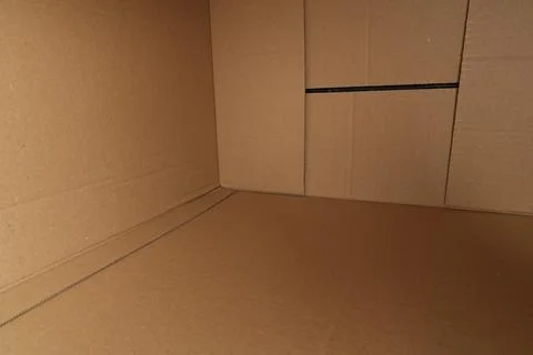 Inside Empty Large Brown Corrugated Cardboard Box for Shipping or Storage w.. Stock Photos