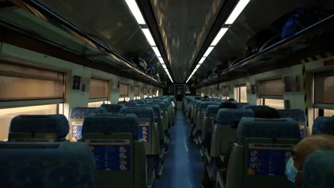 Inside of an empty moving passanger train 4K 60fps Stock Footage 192448676
