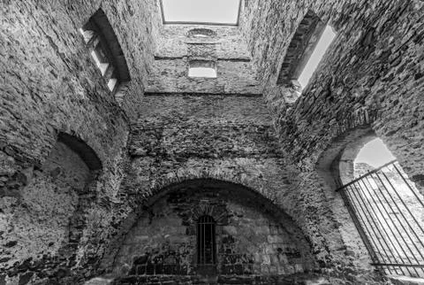 The inside of empty ruined stone tower Stock Photos