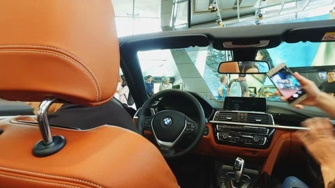 Inside expensive luxury cabriolet car in BMW museum, Munich Stock Footage 107485590