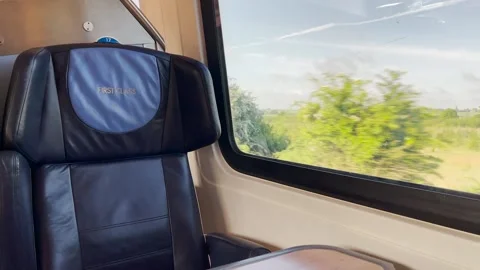 Inside a first class carriage on an English train from London to Stock Footage 197314656