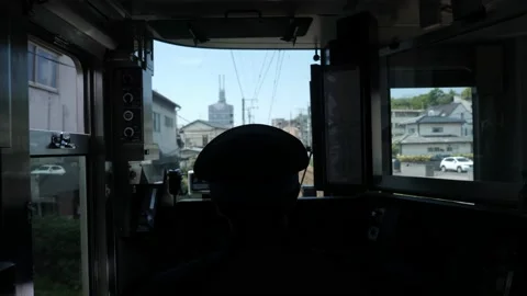 Inside front view of a train with a driver, Japan. Video stock 169481777