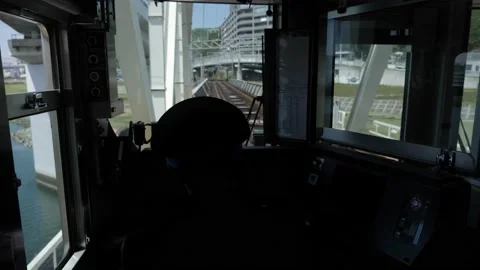 Inside front view of a train with a driver, Japan. Video stock 181176487