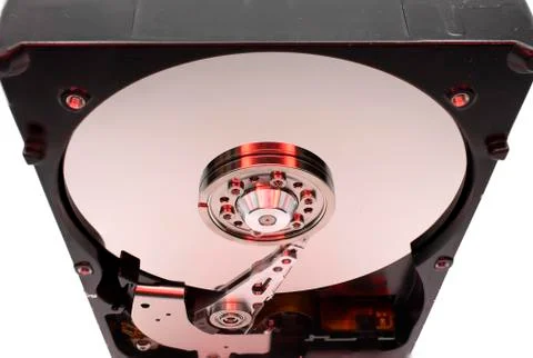 Inside of a hard drive with red reflections Foto stock