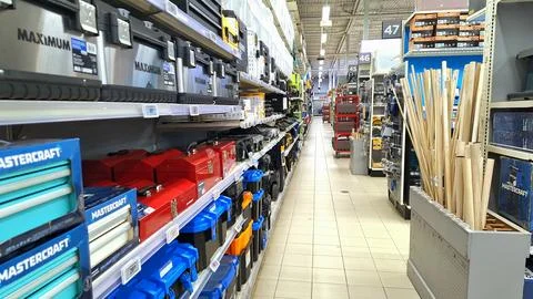 Inside a hardware store aisle in Toronto showcasing various toolboxes. Stock-Fotos