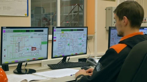 Inside the Heavy Industry Factory Engineer Working dashboard in the control room Stock Footage 104226432