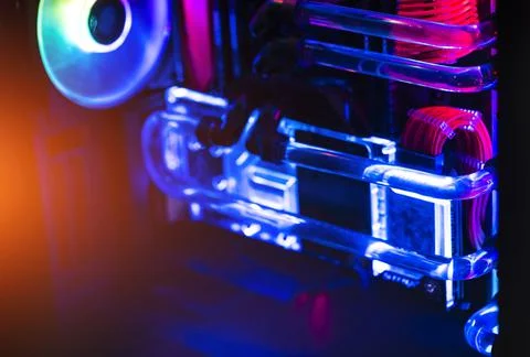 Inside a high performance computer. Computer circuit board and CPU cooling fa Stock Photos