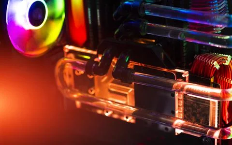 Inside a high performance computer. Computer circuit board and CPU cooling fa Stock Photos