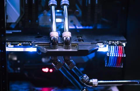 Inside a high performance computer. Computer circuit board and CPU cooling fa Stock Photos