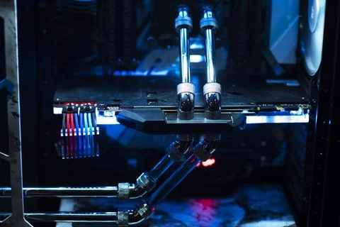 Inside a high performance computer. Computer circuit board and CPU cooling fa Stock Photos