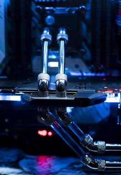 Inside a high performance computer. Computer circuit board and CPU cooling fa Stock Photos