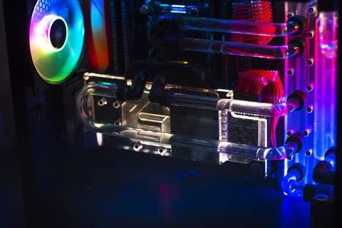 Inside a high performance computer. Computer circuit board and CPU cooling fa Stock Photos