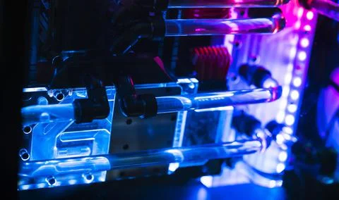 Inside a high performance computer. Computer circuit board and CPU cooling fa Stock Photos