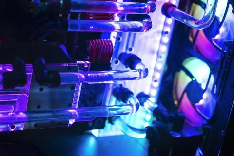 Inside a high performance computer. Computer circuit board and CPU cooling fa Stock Photos