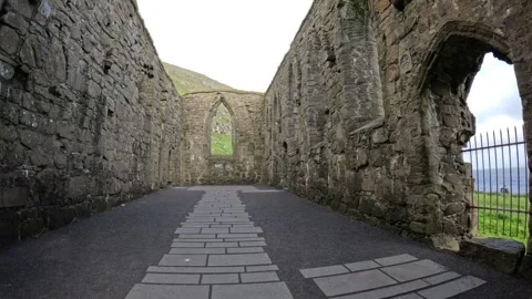 Inside the historic ruins of St Magnus Cathedral in Kirkjubour, Faroe Islands Vidéo 339796859