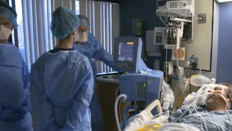 Inside hospital quickly getting overwhelmed with COVID-19 patient (1) Stock Footage 145592039