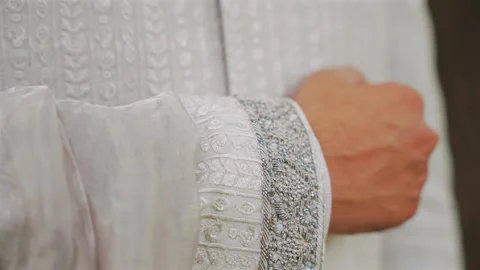 Inside the Indian wedding, the bridegroom brides together and worships the Lord Stock-Footage 275979345