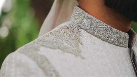 Inside the Indian wedding, the bridegroom brides together and worships the Lord Stock-Footage 275979749