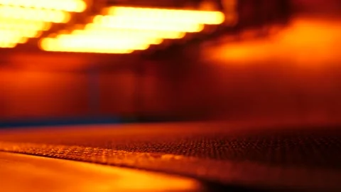 Inside of an infrared conveyor dryer. Defocus video Stock Footage 130651096