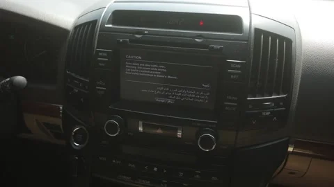 Inside interior Toyota V6 white jeep, car details, radio, steer wheel, handbrake Stock-Footage 205598735