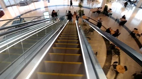 Inside Iryamim mall - going down by the escalator Stock Footage 101441583