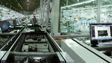 Inside a Laptop Manufacturing Plant - Workers and Machines Stock Footage 306020628