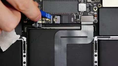 Inside a laptop. View from above. A modern laptop is disassembled to replace  Stock Footage 240894435