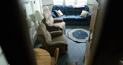 Inside of Large Park Model Camper with Living Room, Kitchen and Dining Area Stock Footage 111983365