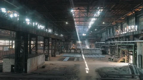 Inside a large warehouse at a metal production plant. Span inside a warehouse 库存影片 148273287