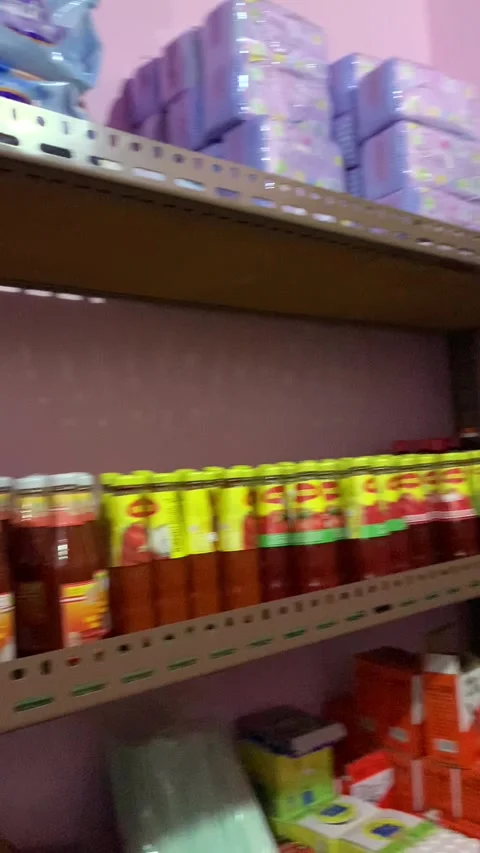 Inside local grocery shop with goods on shelves Maldives vertical Stock Footage 344602876