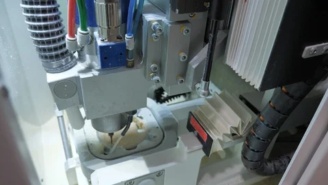 Inside look of 3d CNC dental milling machine Stock Footage 99908129