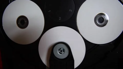Inside machinery cd player,rotating disc,white cd Stock Footage 48786989
