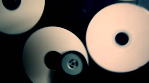 Inside machinery cd player,rotating disc,white cd Stock Footage 48787139