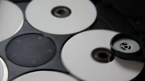 Inside machinery cd player,rotating disc,white cd Stock Footage 48787214