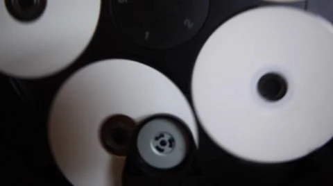 Inside machinery cd player,rotating disc,white cd Stock Footage 48787460