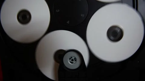 Inside machinery cd player,rotating disc,white cd Stock Footage 48787997