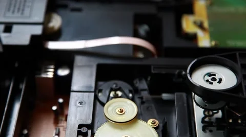 Inside machinery cd player,rotating disc,white cd Stock Footage 48789862