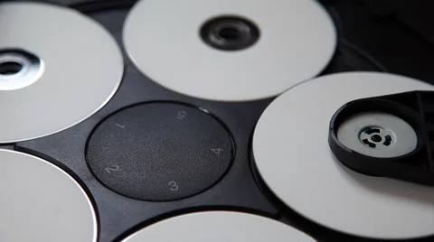 Inside machinery cd player,rotating disc,white cd Stock Footage 48801485