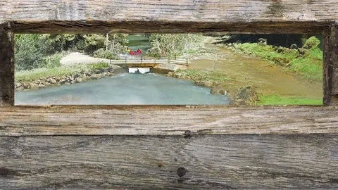 From inside of a mailbox. Kayaker in the river. 動画素材 139823707