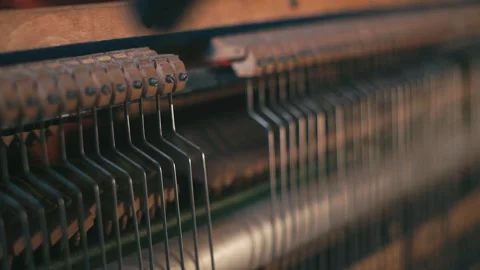 Inside Mallets Hammers hitting Upright Piano Strings. Close Up Stock-Footage 143979507