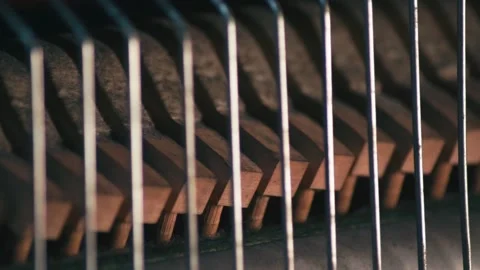 Inside Mallets Hammers hitting Upright Piano Strings. Close Up Stock-Footage 143979509