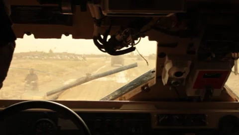 Inside MAT-V(MRAP) Mine Resistant Vehicle Traveling in Afghanistan (HD)c Stock Footage