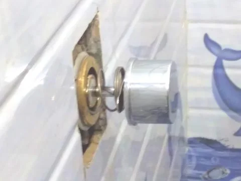 Inside mechanism of the flush button Stock Photos