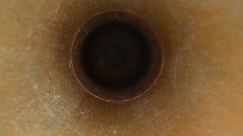 Inside the metal pipe, metallic texture tube. Dolly shot of the lens moving Stock Footage 125462238